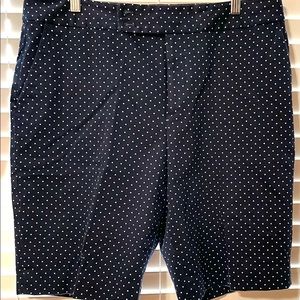 Navy blue shorts with white polka dots